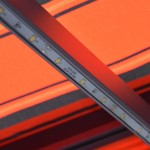 vidaXL Copertină retractabilă manual LED portocaliu/maro, 450 x 300 cm vidaXL Copertină retractabilă manual LED portocaliu/maro, 450 x 300 cm