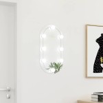 vidaXL Oglindă cu lumini LED, 60x30 cm, sticlă, oval vidaXL Oglindă cu lumini LED, 60x30 cm, sticlă, oval