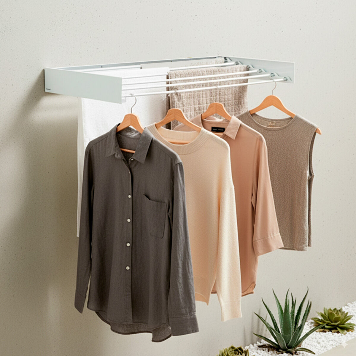 Uscător de rufe pliabil, extensibil și retractabil de perete Dryva 100 InnovaGoods