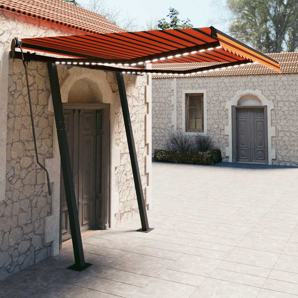 vidaXL Copertină retractabilă manual cu LED portocaliu & maro 3x2,5 m vidaXL Copertină retractabilă manual cu LED portocaliu & maro 3x2,5 m