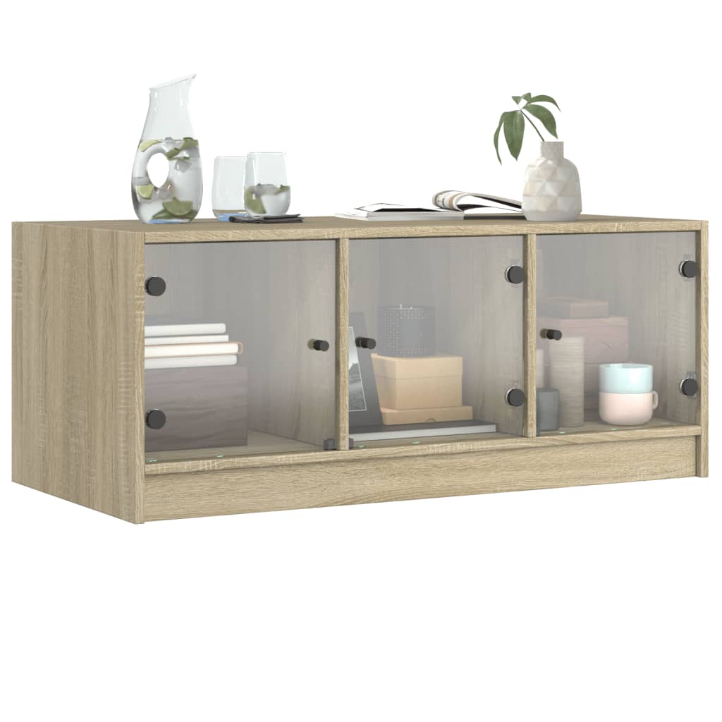 vidaXL Măsuță de cafea cu uși din sticlă, stejar fumuriu, 102x50x42 cm