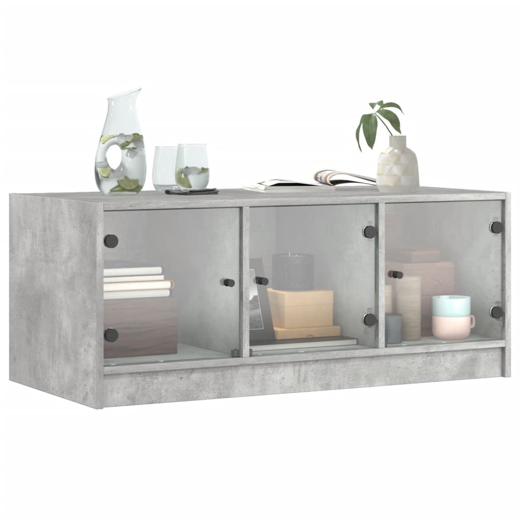 vidaXL Măsuță de cafea cu uși din sticlă, gri beton, 102x50x42 cm vidaXL Măsuță de cafea cu uși din sticlă, gri beton, 102x50x42 cm